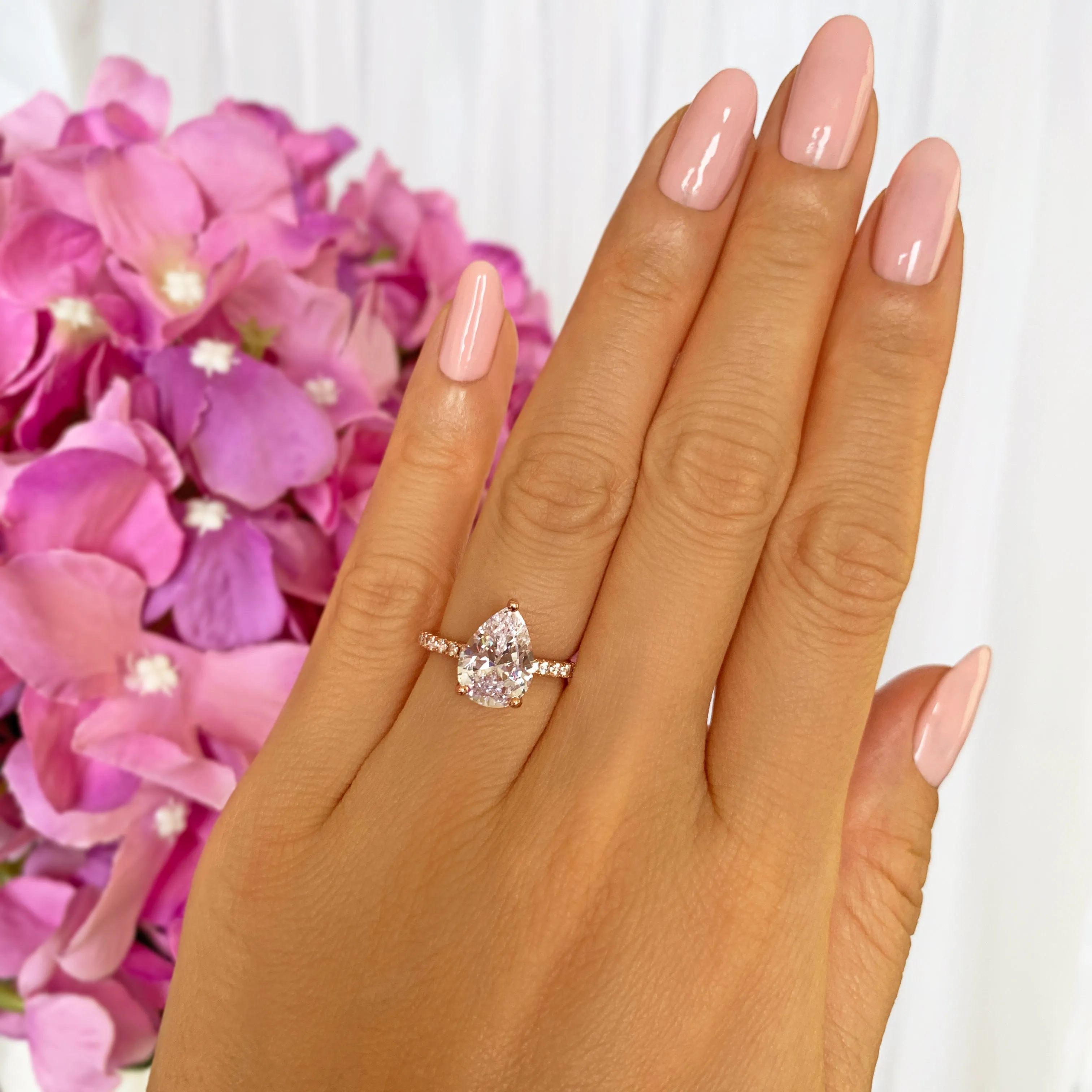 3.25 ctw Pear Accented Solitaire Ring - Rose GP