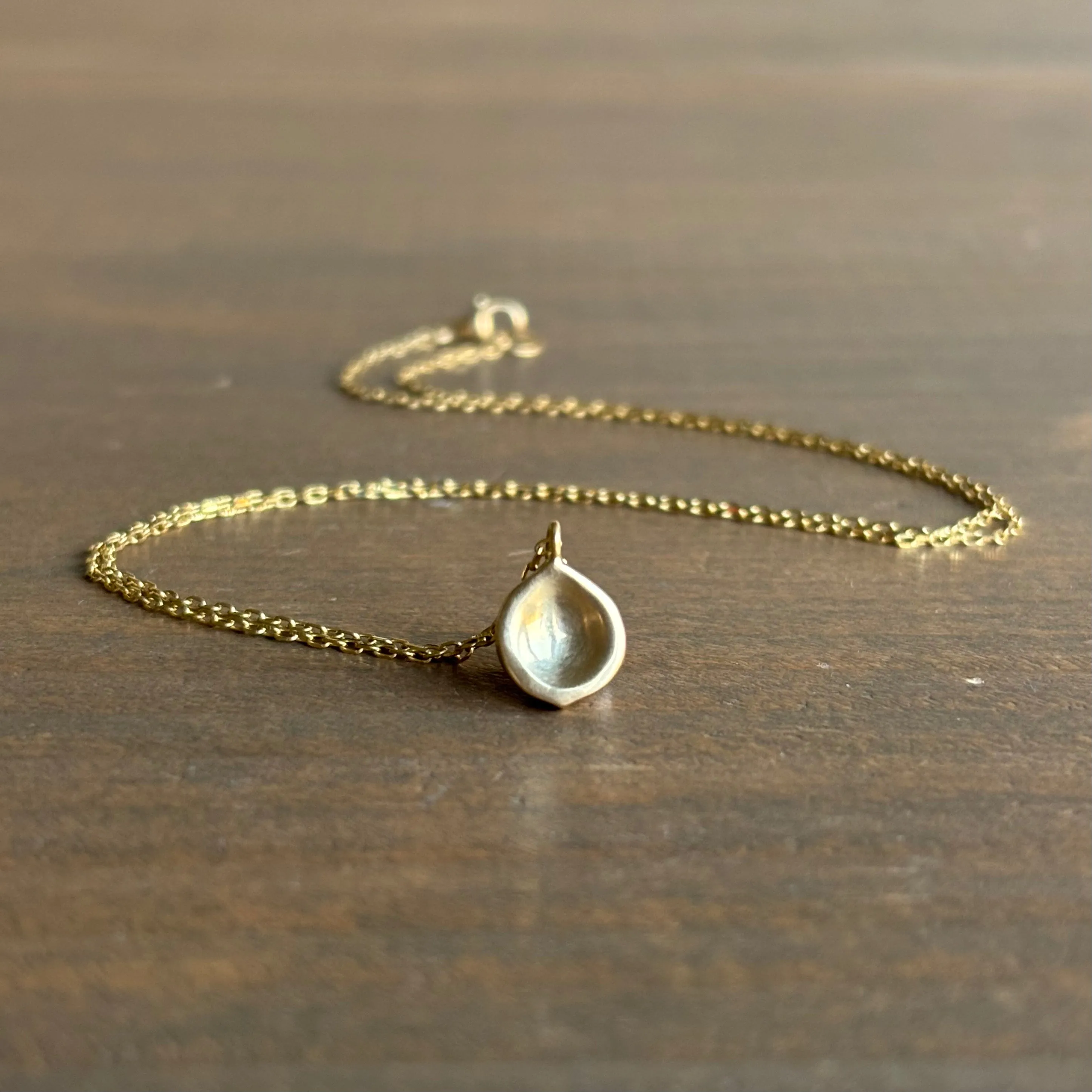 Gold Seed Pendant